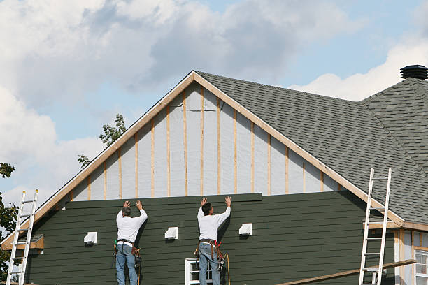 Professional Siding Repair technician working in Newark, NY